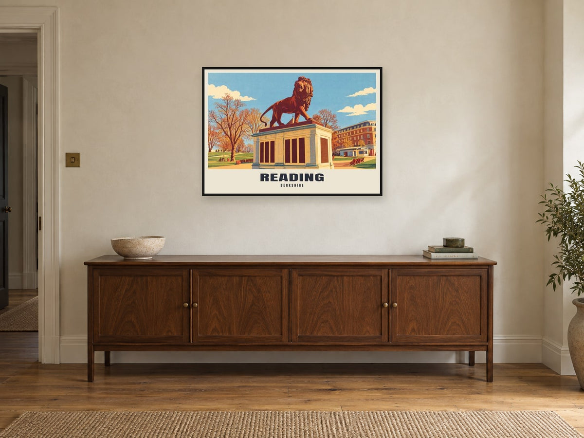 Reading poster displayed above a wooden sideboard in a digitally created room mockup