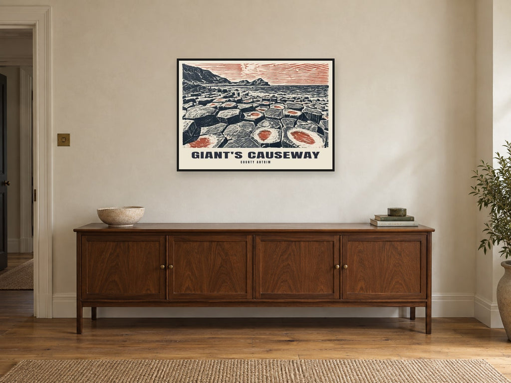 County Antrim, Giant's Causeway Poster at A1, in a black frame, above a sideboard