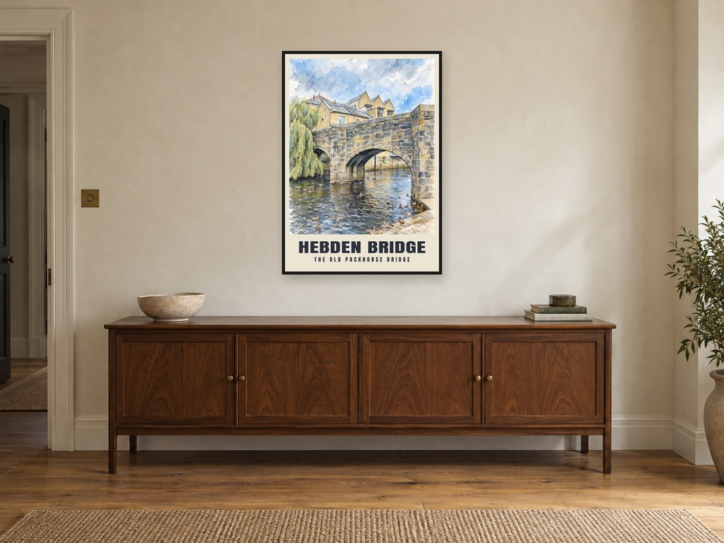 The Old Packhorse Bridge, Hebden Bridge Poster at A1, in a black frame, above a sideboard
