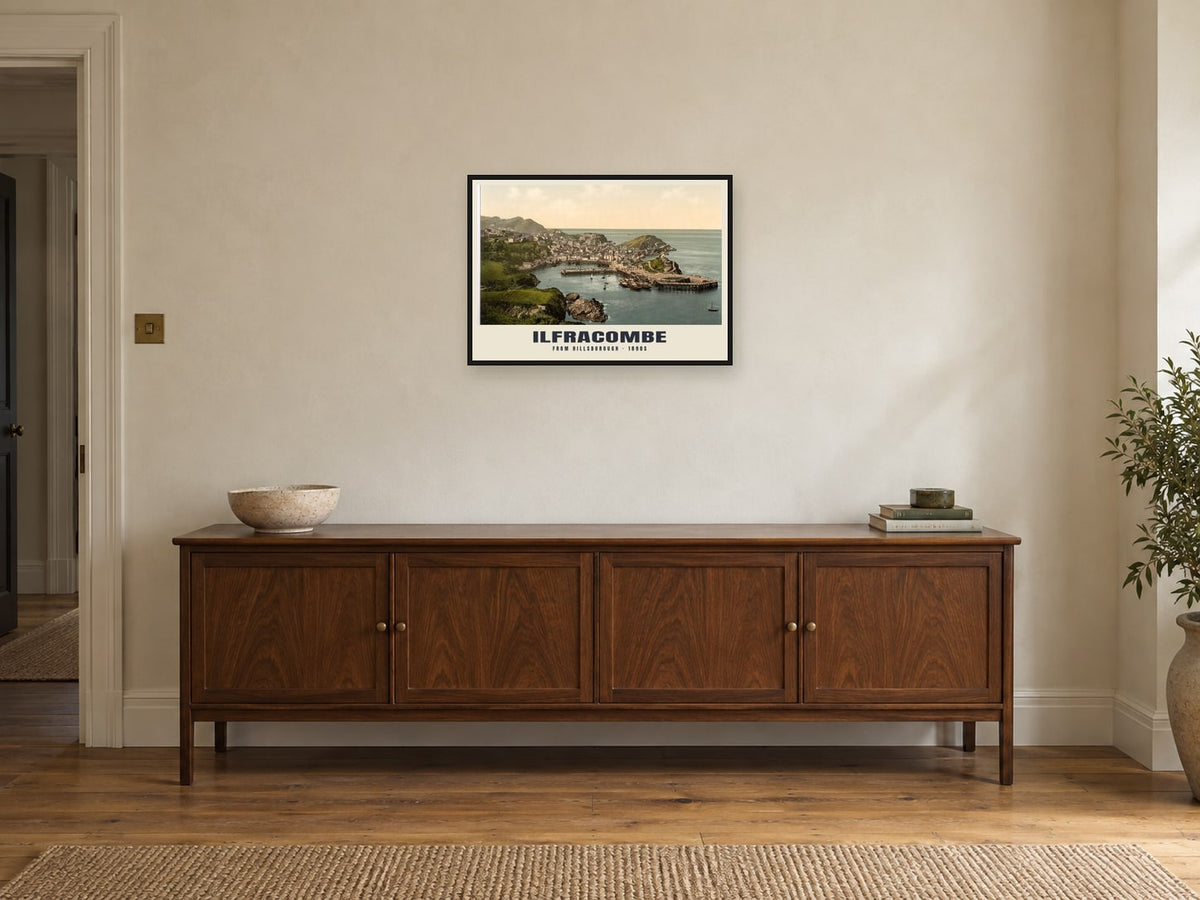 From Hillsborough, Ilfracombe Poster at A2, in a black frame, above a sideboard