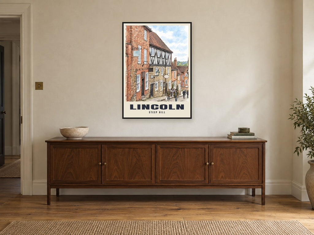 Steep Hill, Lincoln Poster at A1, in a black frame, above a sideboard