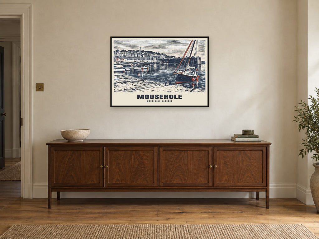Mousehole Harbour Poster at A1, in a black frame, above a sideboard