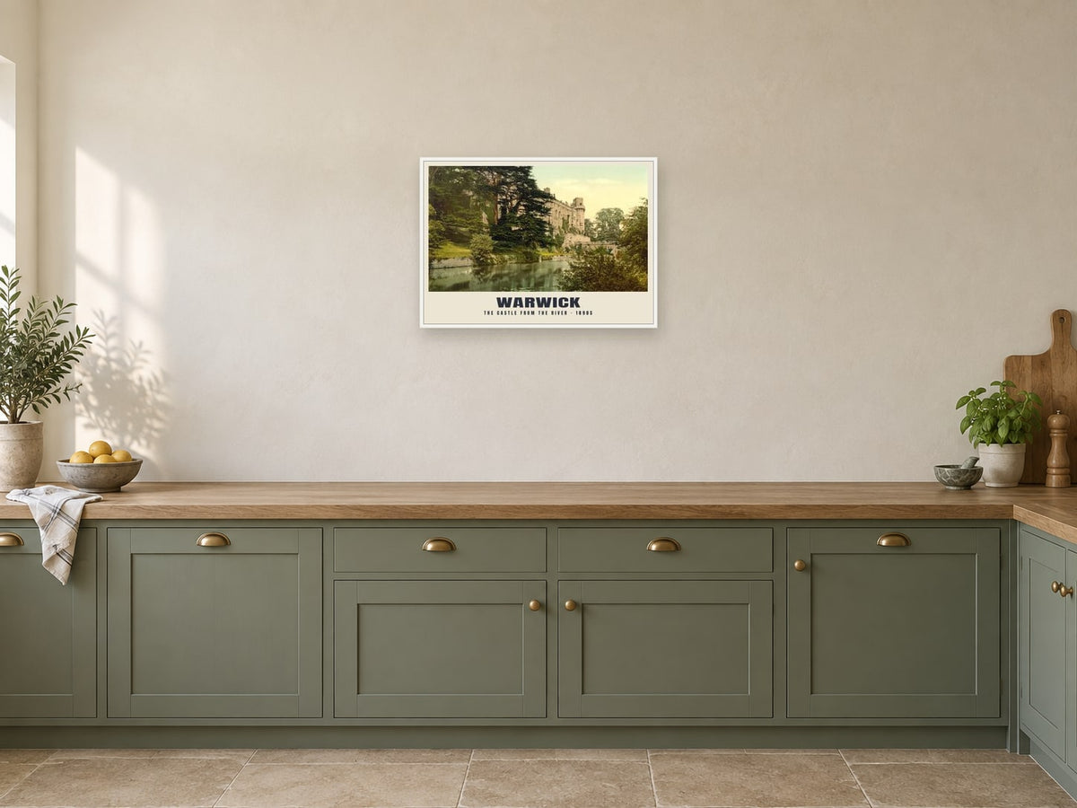 The Castle from the River, Warwick, 1890s Heritage Print at A2, in a white frame, in a kitchen